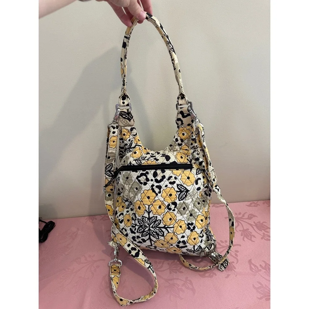 Vera Bradley yellow and‎ black drawstring backpack and shoulder bag